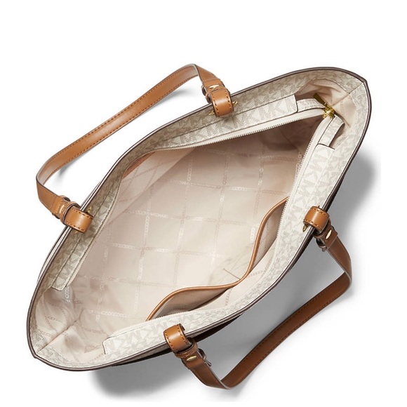 MICHAEL Michael Kors Tote
• Zip closure
• Double handles

• 14" W × 10" H × 5" D - Picture 3 of 5